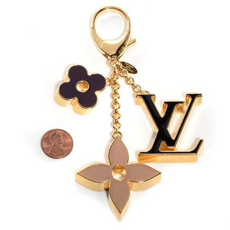 decorating bag using louis vuitton bag charm|authentic Louis Vuitton keychain.